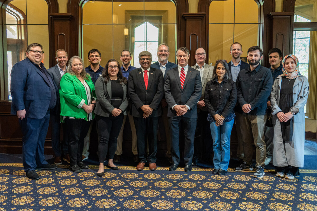 Photo of NSF Director Sethuraman Panchanathan, Indiana Senator Todd Young, and members of leadership at Notre Dame photographed together. Photo by Angie Hubert, Notre Dame Research