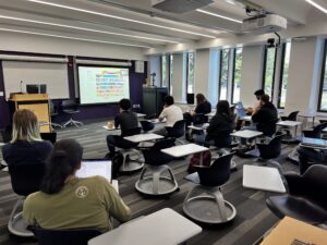 Students attending the 2025 SpectrumX Summer School at UAlbany listen to an expert lecture