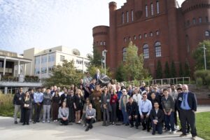 Group photo at the Fall Center Meeting at UW-Madison in front of a badger statue behind the Pyle Center